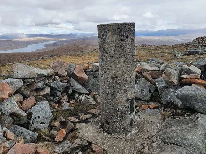Mountain Cairn with loch far below.